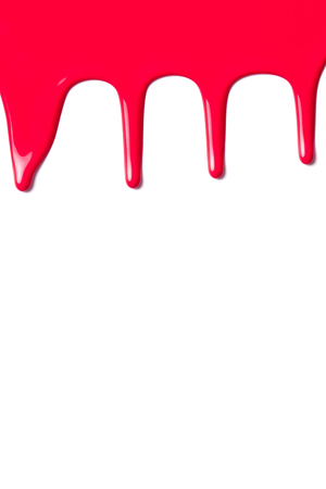 Drip paint on a white background.の写真素材