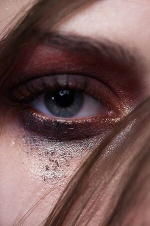Colorful eye makeup closeup.の写真素材