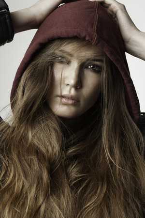 Sexy girl in leather jacket in studioの写真素材