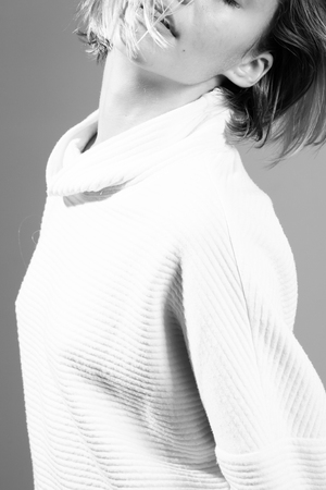 Creative fashion photo of a girl model in designer clothesの写真素材