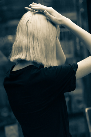 Creative fashion photo of a girl model in designer clothesの写真素材