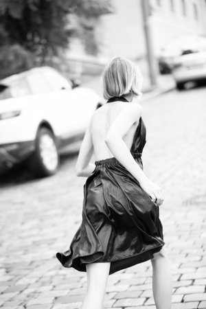 Creative fashion photo of a girl model in designer clothesの写真素材