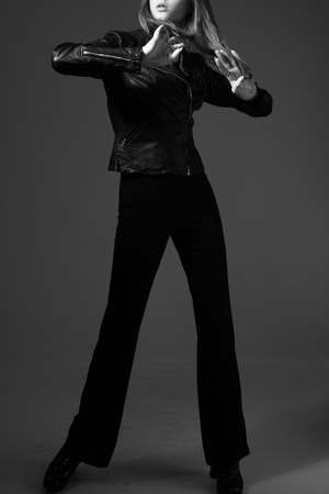 Photo of a girl in fashionable clothes close-upの写真素材