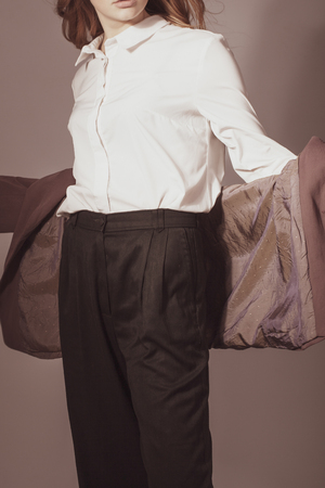 Creative fashion photo of a girl model in designer clothesの写真素材