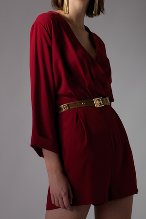 Creative fashion photo of a girl model in designer clothesの写真素材