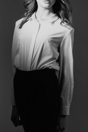 Creative fashion photo of a girl model in designer clothesの写真素材