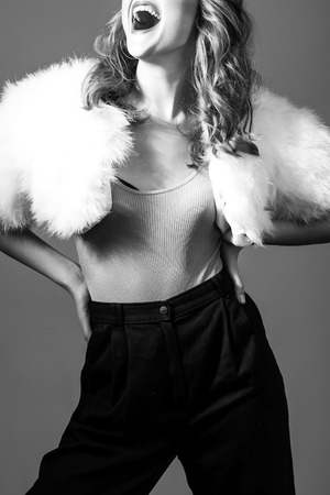 Creative fashion photo of a girl model in designer clothesの写真素材