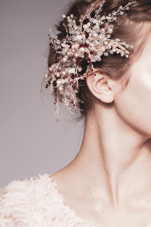 Stylish photo with a smart model in fashionable clothes in the studioの写真素材