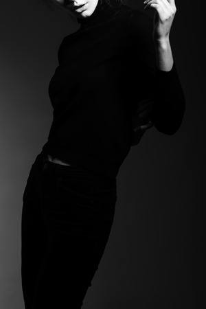 Stylish photo with a smart model in fashionable clothes in the studioの写真素材