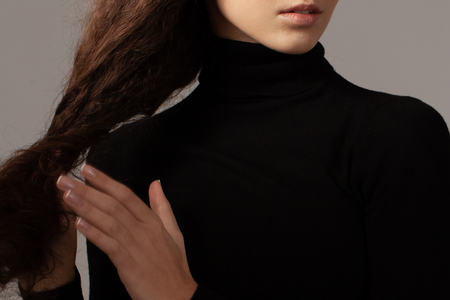 Stylish black and white flotation model in the studioの写真素材