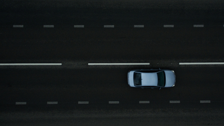 Car on the road. View from aboveの写真素材