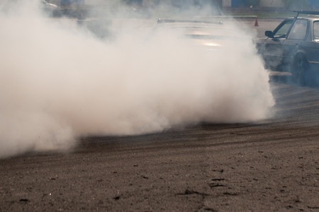 Sports beautiful cars drift on the racetrack