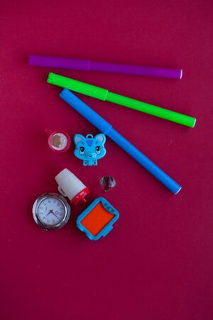 Photo of a toy car on a red background close-up.の写真素材