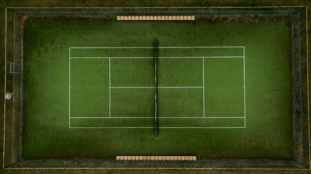 Photo of a tennis green field from a height.の写真素材