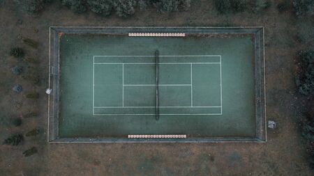 Photo of a tennis green field from a height.の写真素材