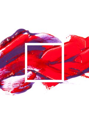 The texture of red lipstick on a white background, close-up.の写真素材