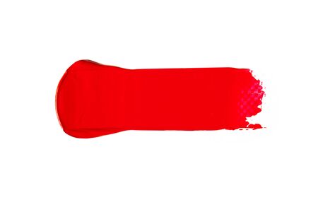 The texture of red lipstick on a white background, close-up.の写真素材