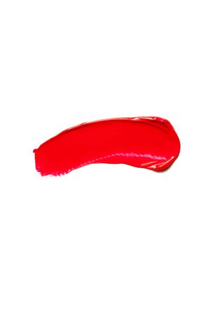 The texture of red lipstick on a white background, close-up.の写真素材