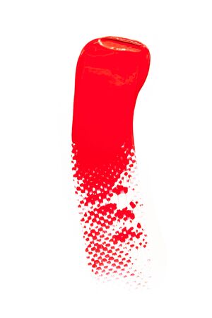 Trace of pink lipstick on a white background.の写真素材