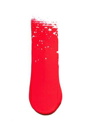 Trace of pink lipstick on a white background.の写真素材