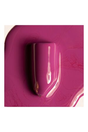 Photo of a lilac texture from lipstick on a white background.の写真素材