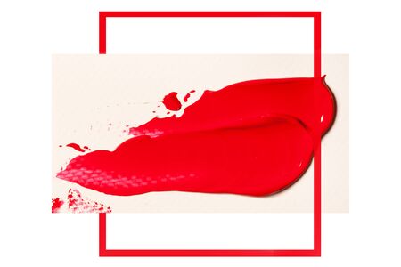 Trace of pink lipstick on a white background.の写真素材