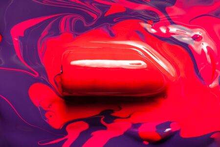 Red cosmetics for a woman. A sample on a white background.の写真素材