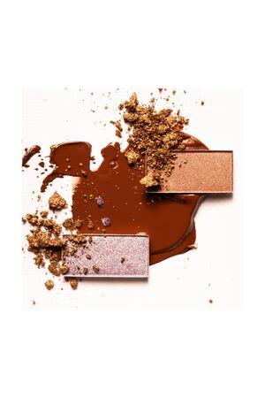 Brown eye shadow on a white background.の写真素材