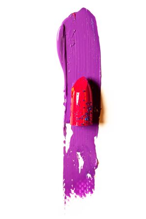 Beautiful photo of red lipstick, texture of red lipstick on a white background close-up.の写真素材