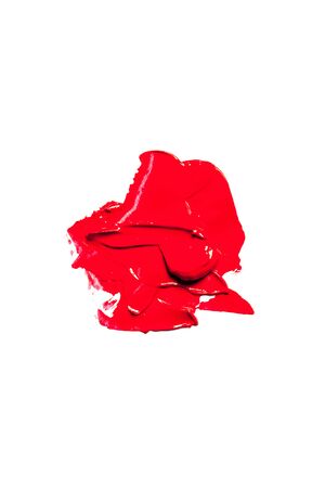 Beautiful photo of red lipstick, texture of red lipstick on a white background close-up.の写真素材