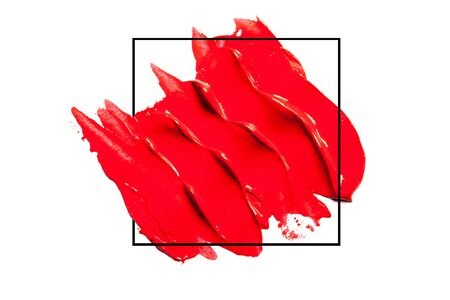 Beautiful photo of red lipstick, texture of red lipstick on a white background close-up.の写真素材