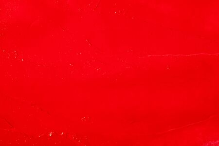 Beautiful photo of red lipstick, texture of red lipstick on a white background close-up.の写真素材