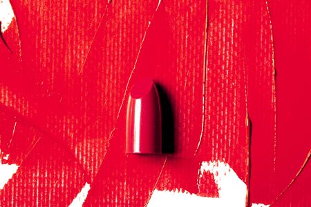 Beautiful photo of red lipstick, texture of red lipstick on a white background close-up.の写真素材
