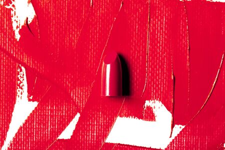 Beautiful photo of red lipstick, texture of red lipstick on a white background close-up.の写真素材