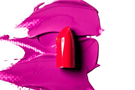 Beautiful photo of red lipstick, texture of red lipstick on a white background close-up.の写真素材