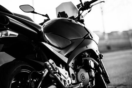 Black sports motorcycle close-up on the street.の写真素材