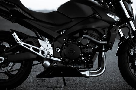 Black sports motorcycle close-up on the street.の写真素材