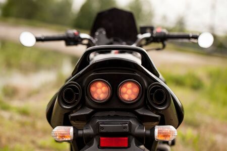 Sports black motorcycle near the power plant.の写真素材