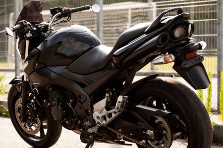 Black motorcycle close-up on the street.の写真素材