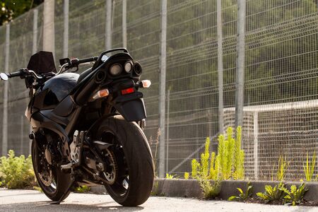 Black motorcycle close-up on the street.の写真素材