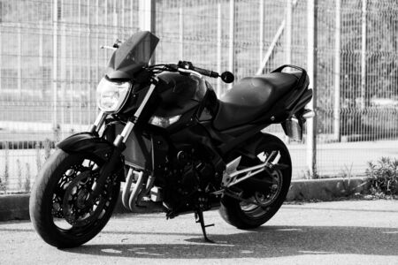 Black motorcycle close-up on the street.の写真素材
