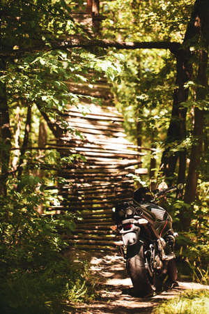 Sporty black Suzuki motorcycle in nature.のeditorial素材