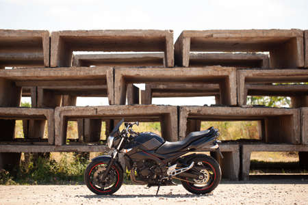 Sporty black Suzuki motorcycle in nature.のeditorial素材