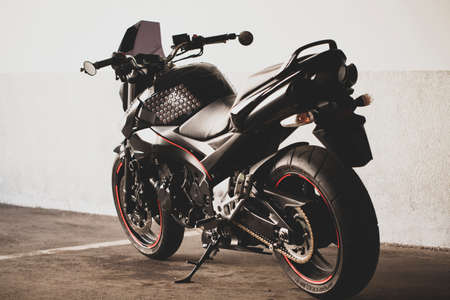 UKRAINE, KIEV - NOVEMBER 12, 2020: Sporty black Suzuki motorcycle in nature.のeditorial素材