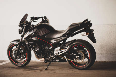 UKRAINE, KIEV - NOVEMBER 12, 2020: Sporty black Suzuki motorcycle in nature.のeditorial素材