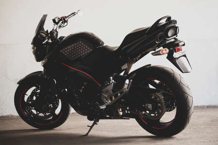 Sporty black Suzuki motorcycle in nature.のeditorial素材