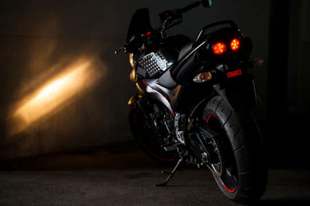 UKRAINE, KIEV - NOVEMBER 12, 2020: Sporty black Suzuki motorcycle in nature.のeditorial素材