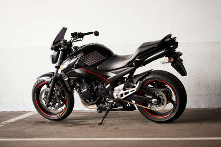 Sporty black Suzuki motorcycle in nature.のeditorial素材