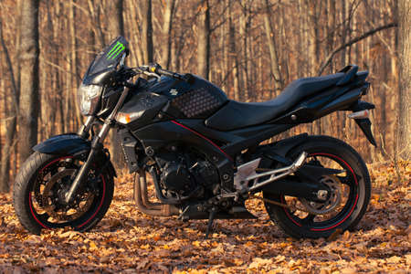 Black Suzuki GSR600 motorcycle in nature.のeditorial素材