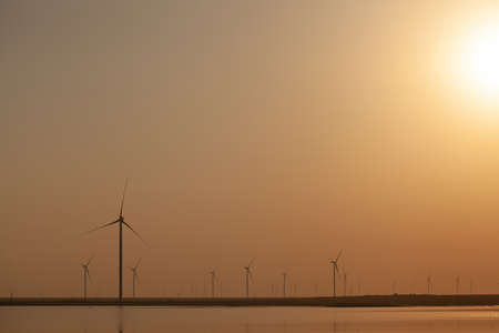 Modern electric mills and the sea.